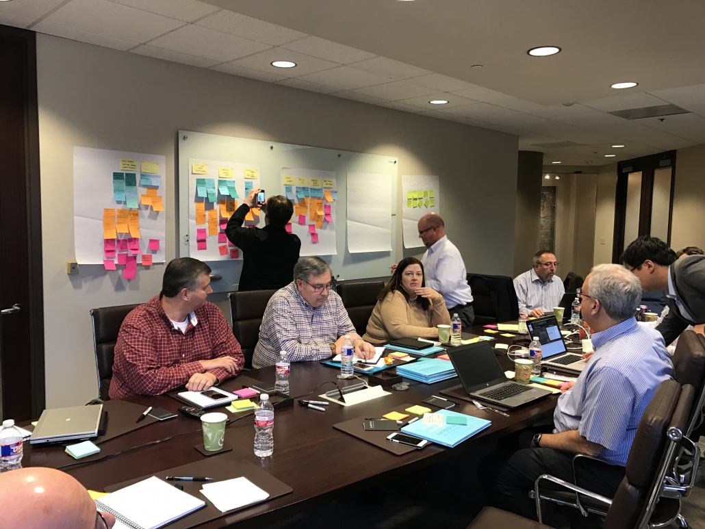 Financial stakeholders and research team prioritizing opportunities for the prototype MVP